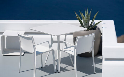 white-table-chairs-terrace-oia-santorini